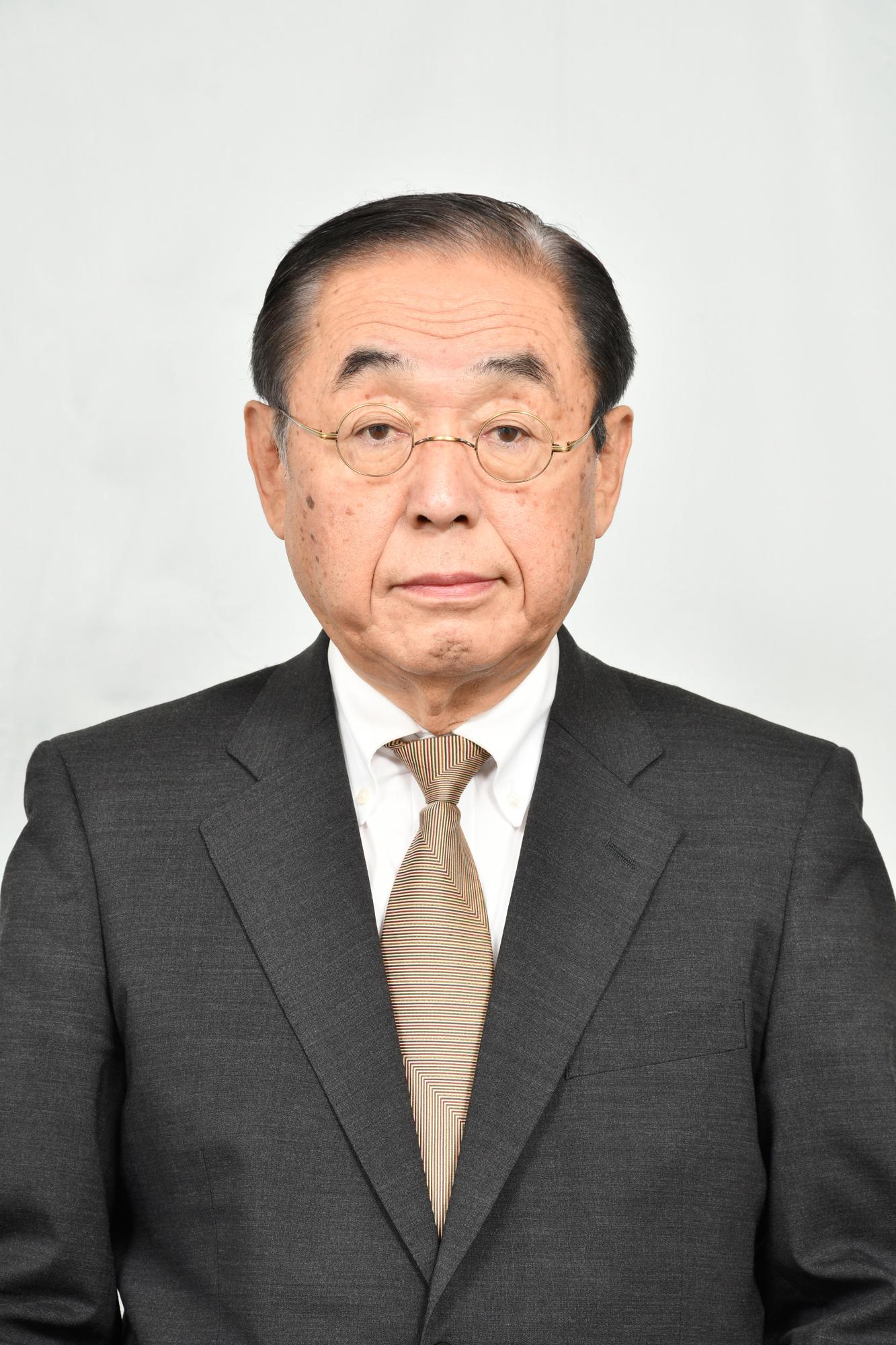 功績者の小嶋彌左衛門さんの顔写真