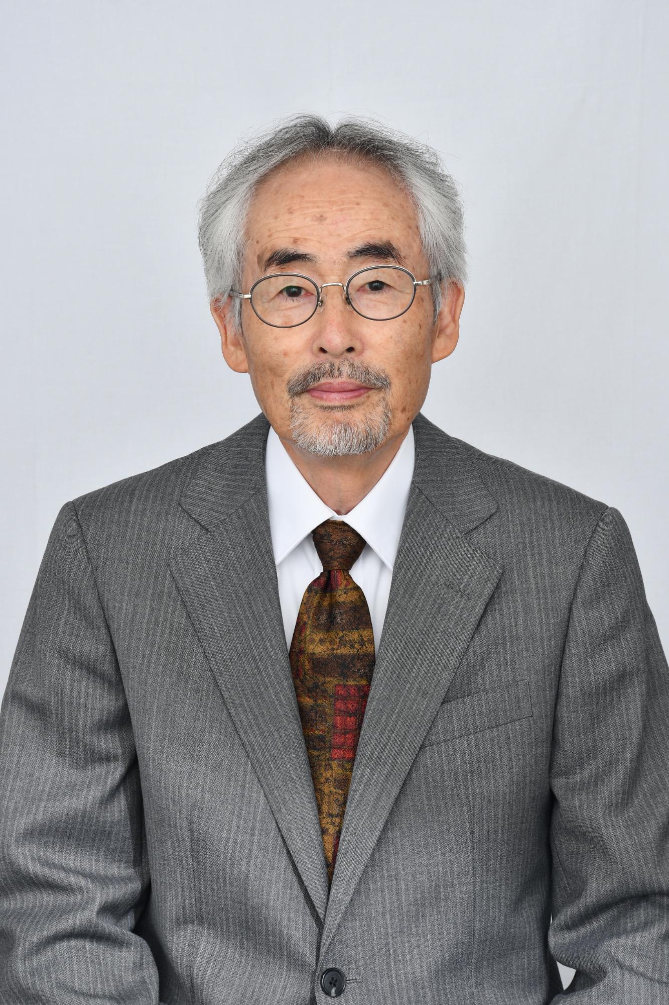 功労者の梅津幸保さんの顔写真